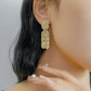 Gold Tag Brushed Metal Drop Earrings